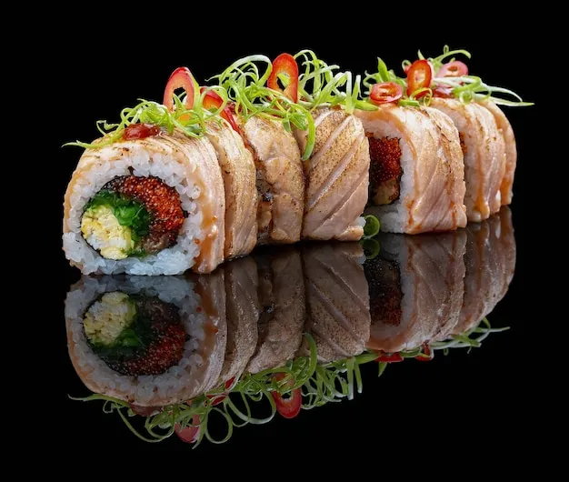 Elaborate house special roll topped with fresh seafood.