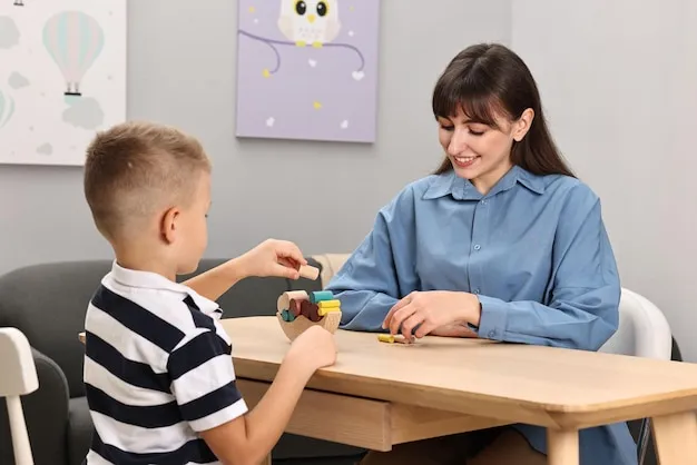 Sesión individual de terapia ABA entre terapeuta y niño en clínica.