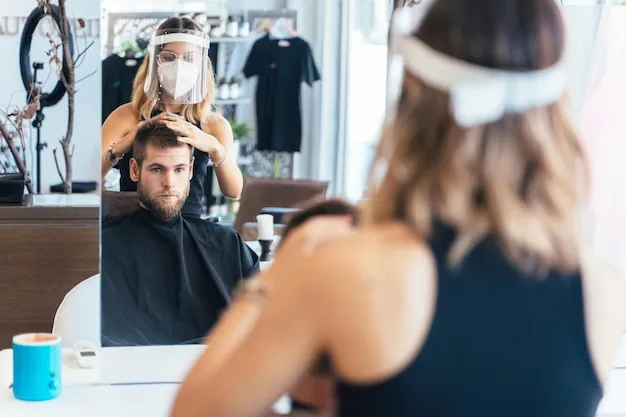 Client admiring a sleek, modern haircut in salon mirror.