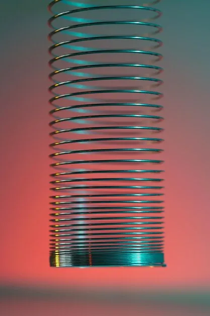 Close-up of rotating cylinder exhibit warping perceptions of straight objects.