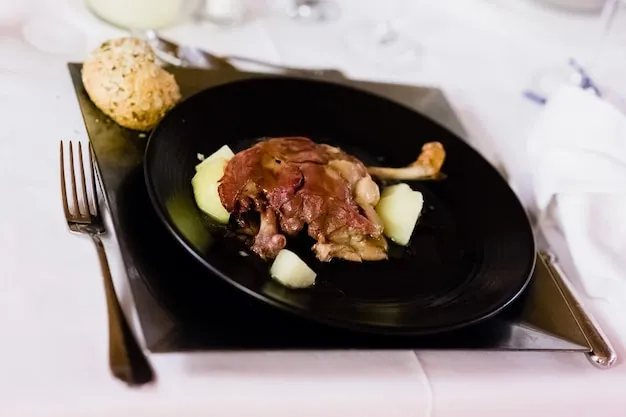 Duck confit with glossy cherry gastrique.