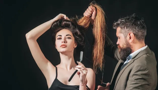 Professional styling session creating a voluminous, shiny hairstyle.
