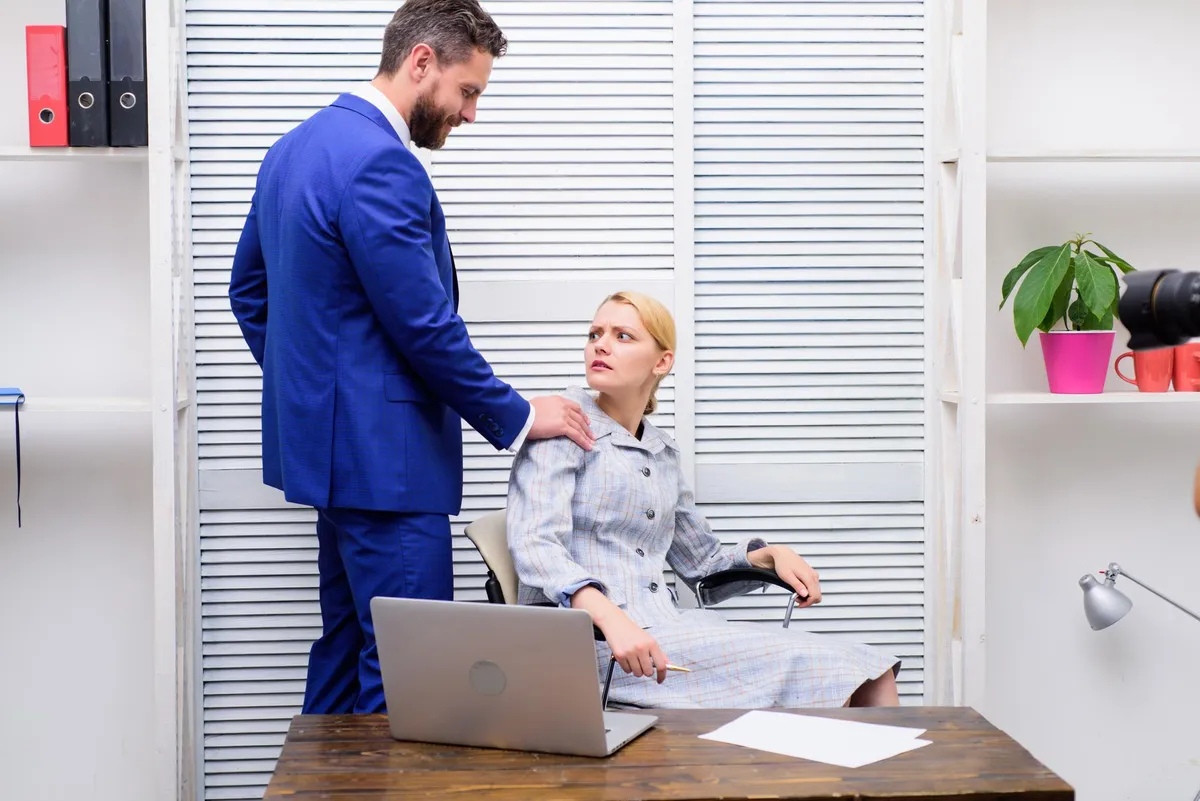 Lawyer and client examining paperwork related to a slip and fall incident.
