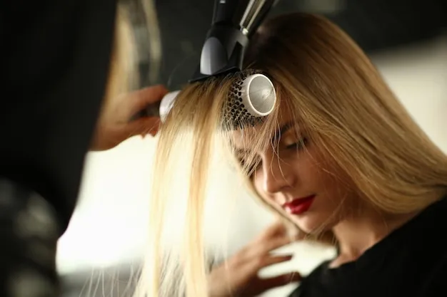 Client enjoying a voluminous blowout styling session.