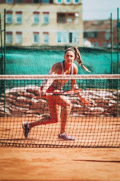 Dynamic padel match on outdoor court with players in action under Miami sunshine.