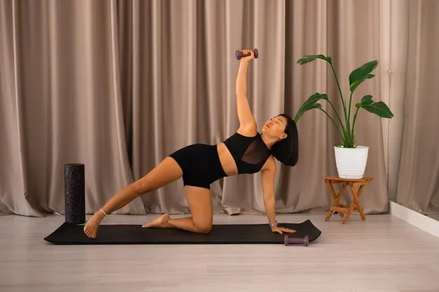 Participants holding weights in yoga sculpt warrior pose.