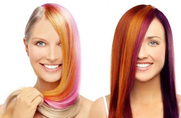 Client’s hair being colored in bright, healthy tones.