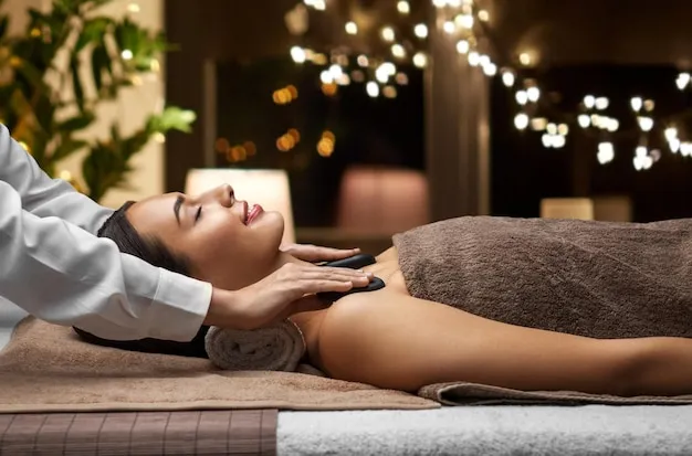 Client enjoying customized wellness therapy in elegant spa.