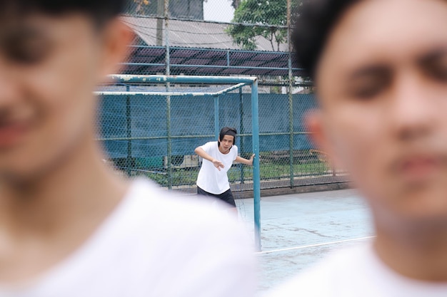 Players engaged in private padel game on dedicated court.
