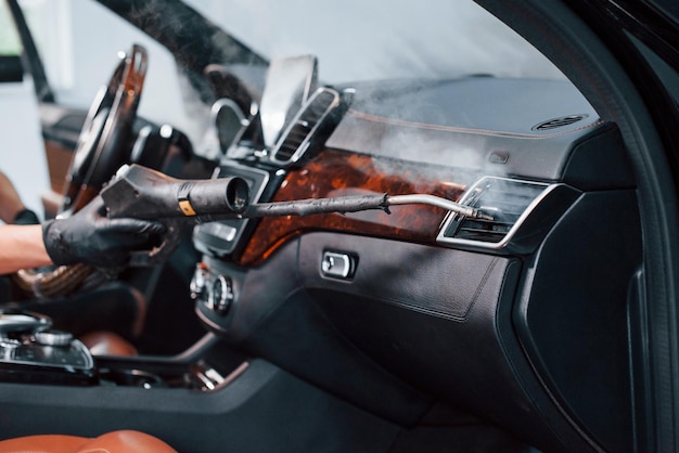 Immaculately cleaned vehicle interior dashboard, seats, and floors.