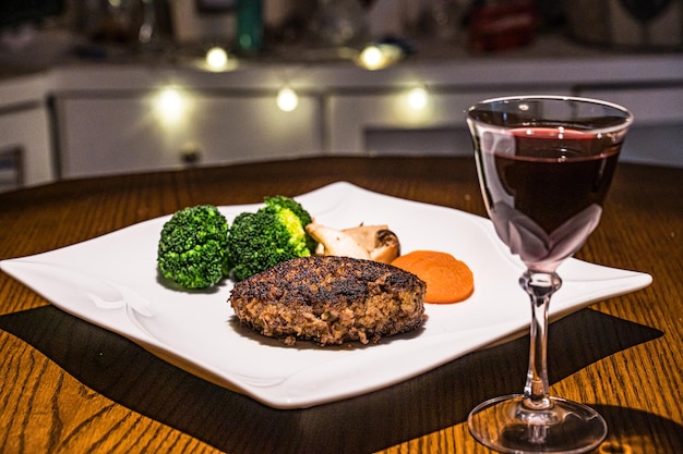 Generous portion of grilled steak with accompaniments.