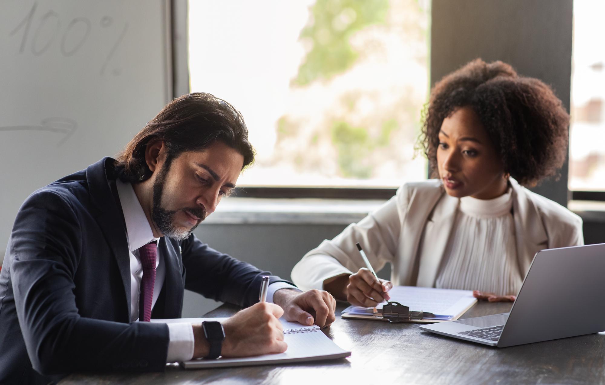 Lawyer assisting client in setting up new business entity.