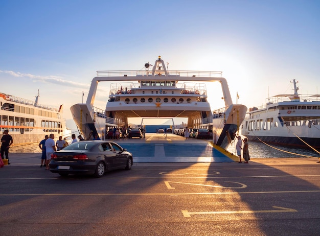 Uber cars unloading luggage at the Port Miami drop-off zone.