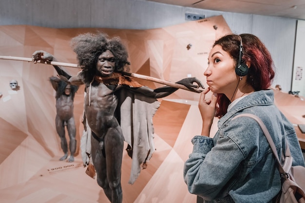 Happy visitors exploring interactive paradox exhibits together inside Paradox Museum Miami.