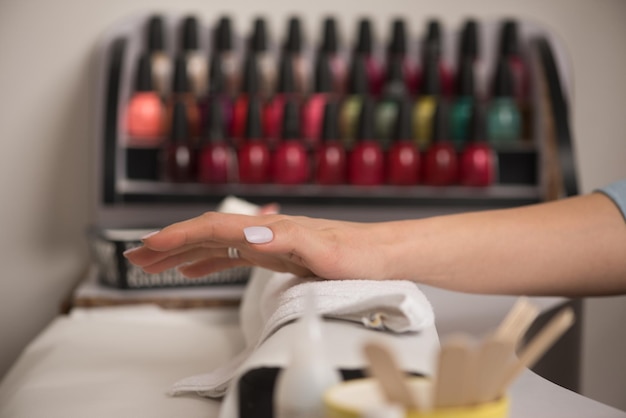 Detailed manicure service with fresh polish and neat nails.