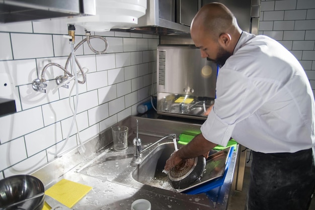 Maintenance work on commercial grease trap.