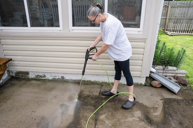 Professional pressure washing transforming a home driveway in Miami