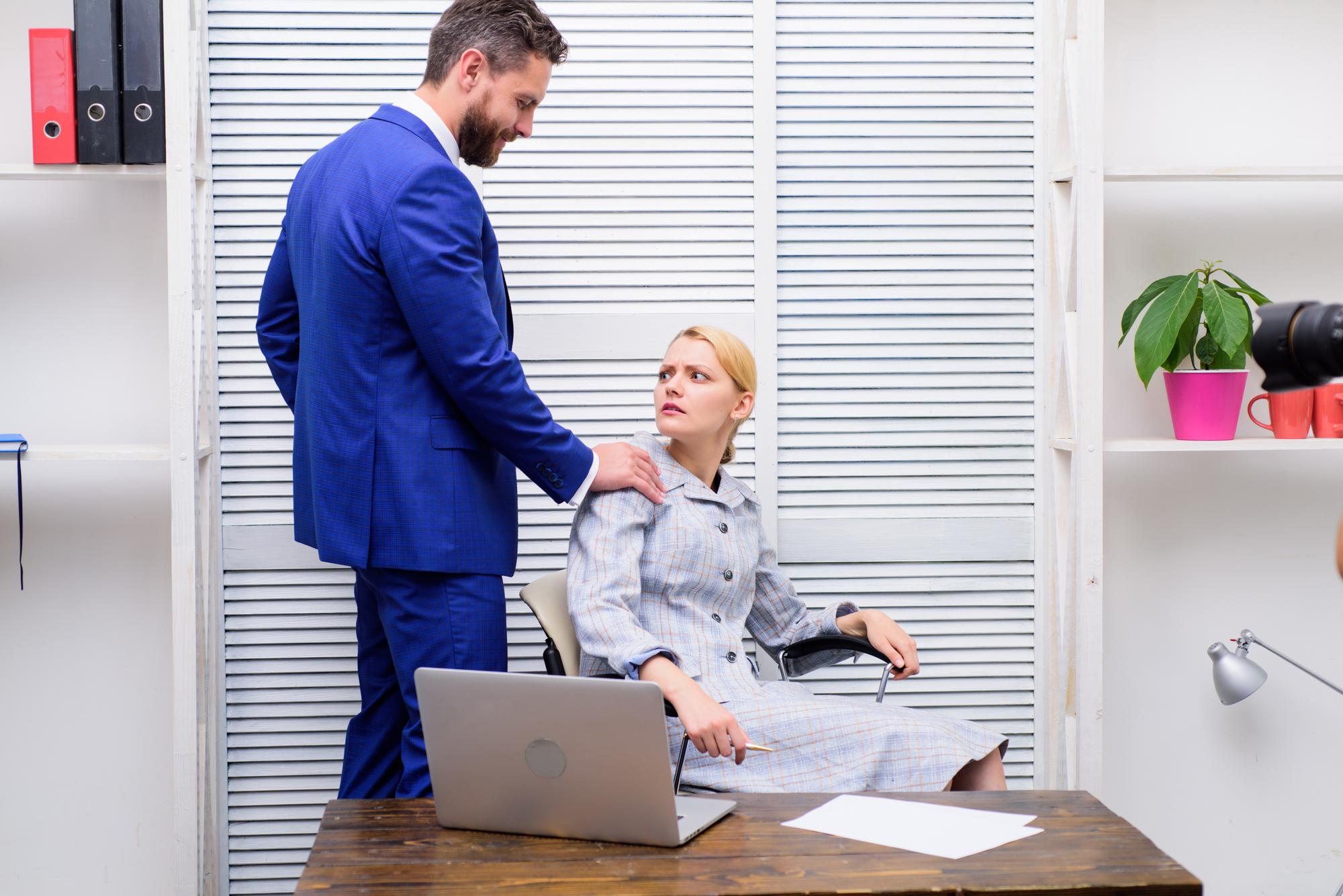 Lawyer and client examining paperwork related to a slip and fall incident.