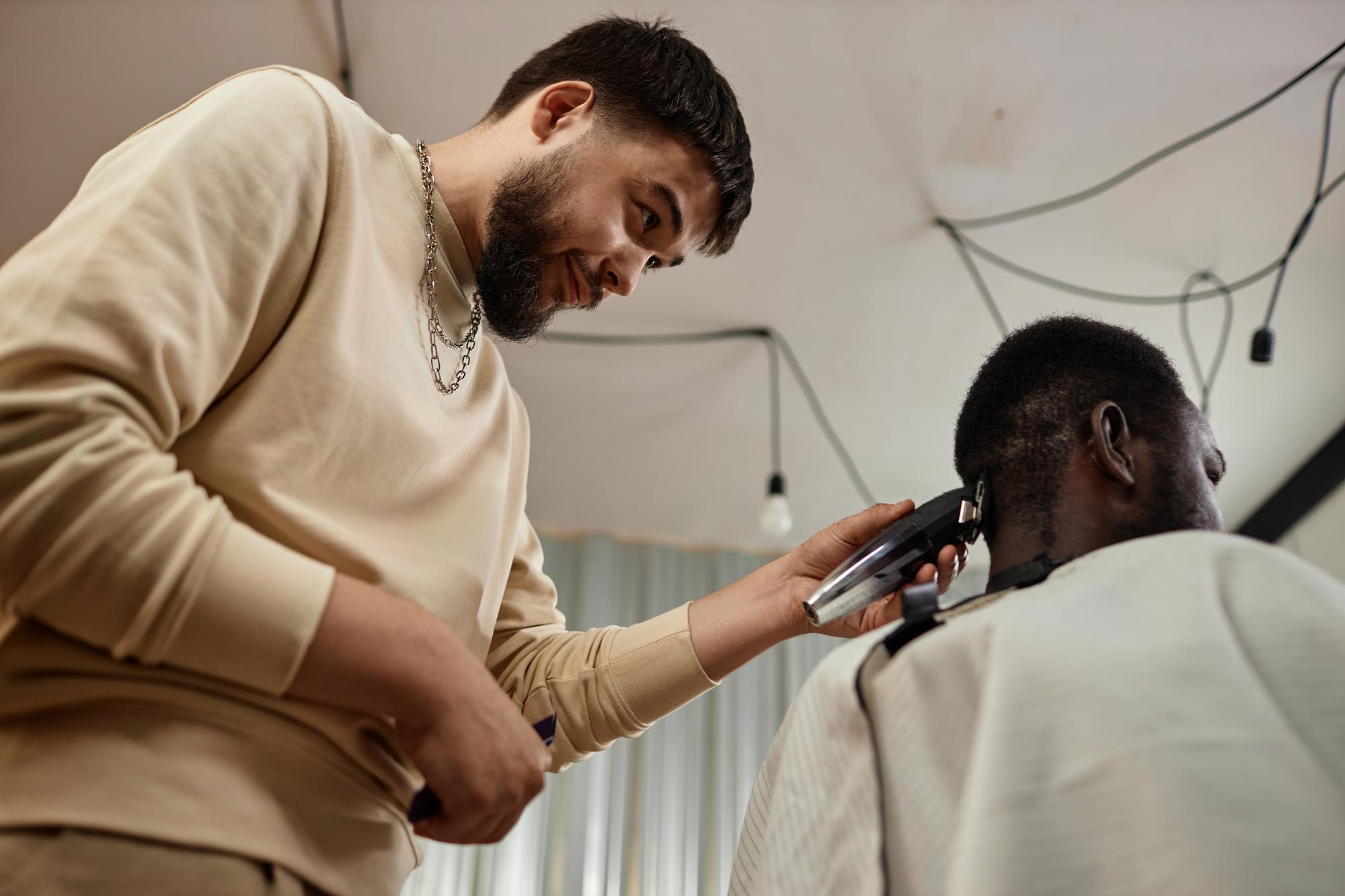 Professional taper cut being styled by barber.