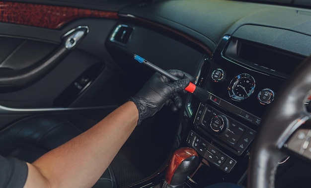 Clean dashboard and trim surfaces in car interior.