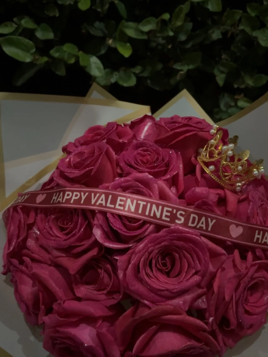 Premium deep pink roses with a golden crown and Valentine's ribbon