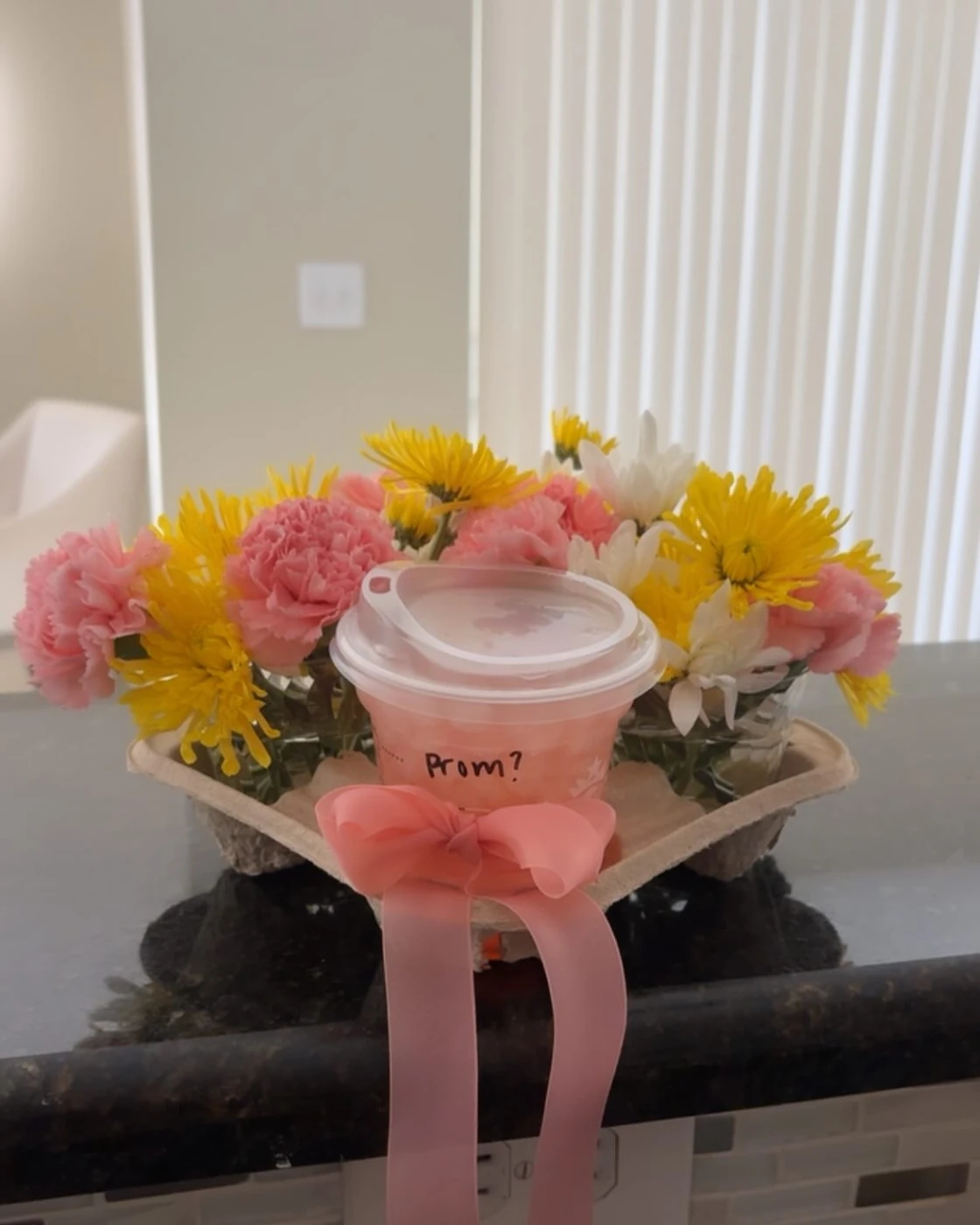 Promposal with pink and yellow flowers